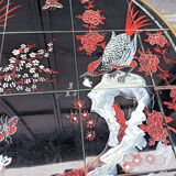 Round coffee table with Japanese bird and flower decor