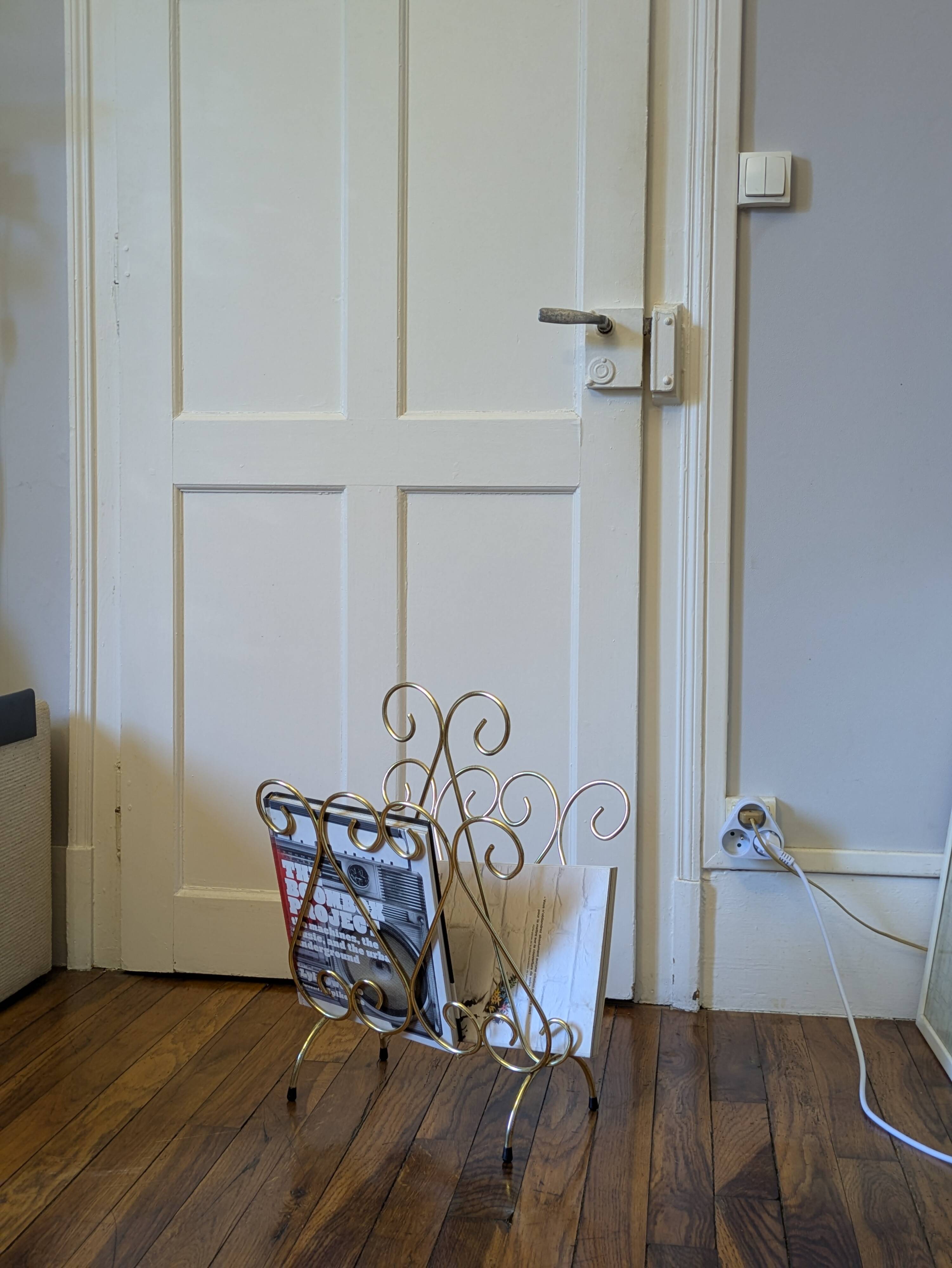 Golden wire magazine rack 1960