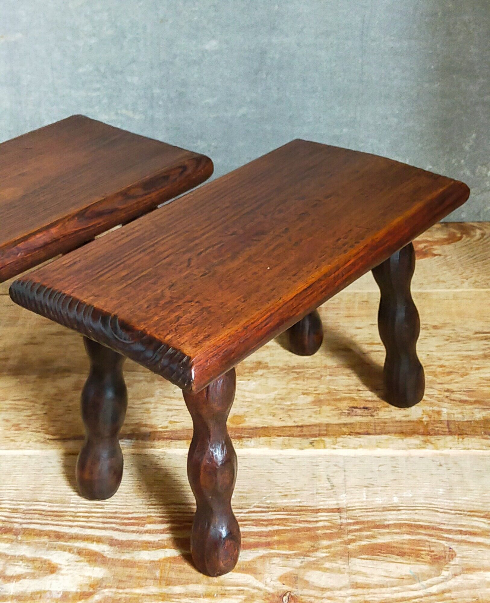 Pair of vintage solid turned wood footstools