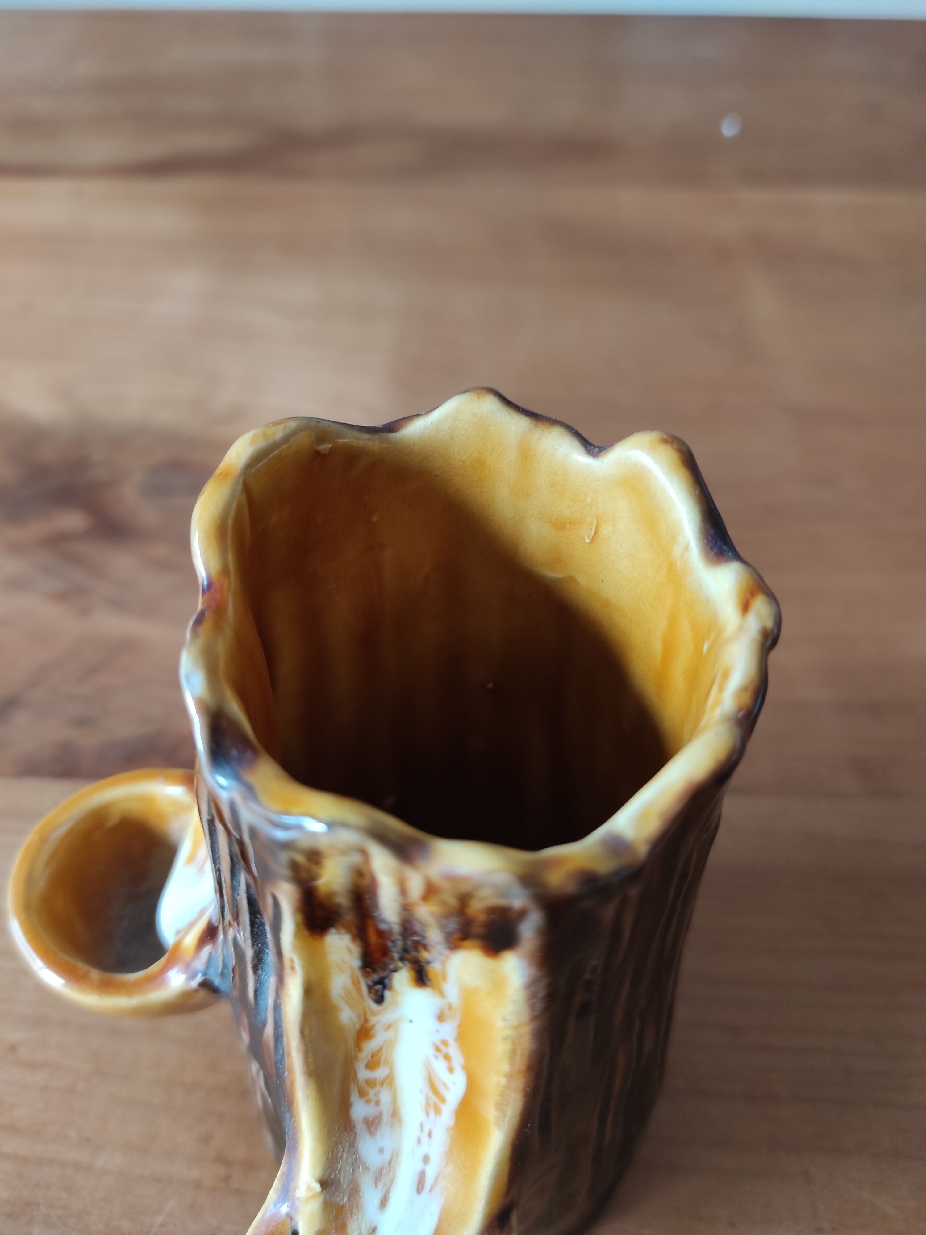 Ceramic vase with tree trunk decoration