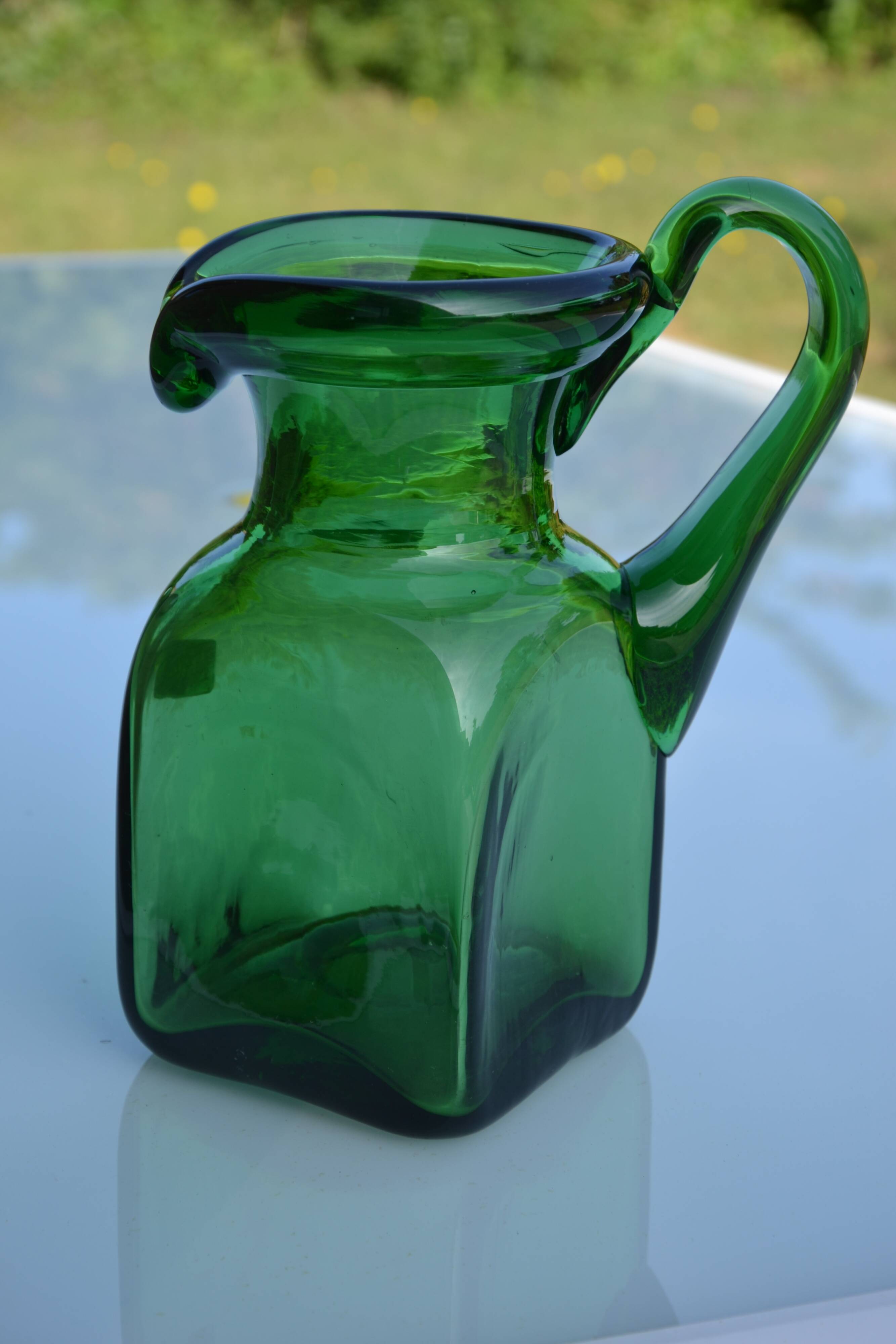 Handcrafted green glass pitcher from Spain