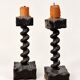 Charming pair of antique turned wooden candlesticks, featuring a beautiful p