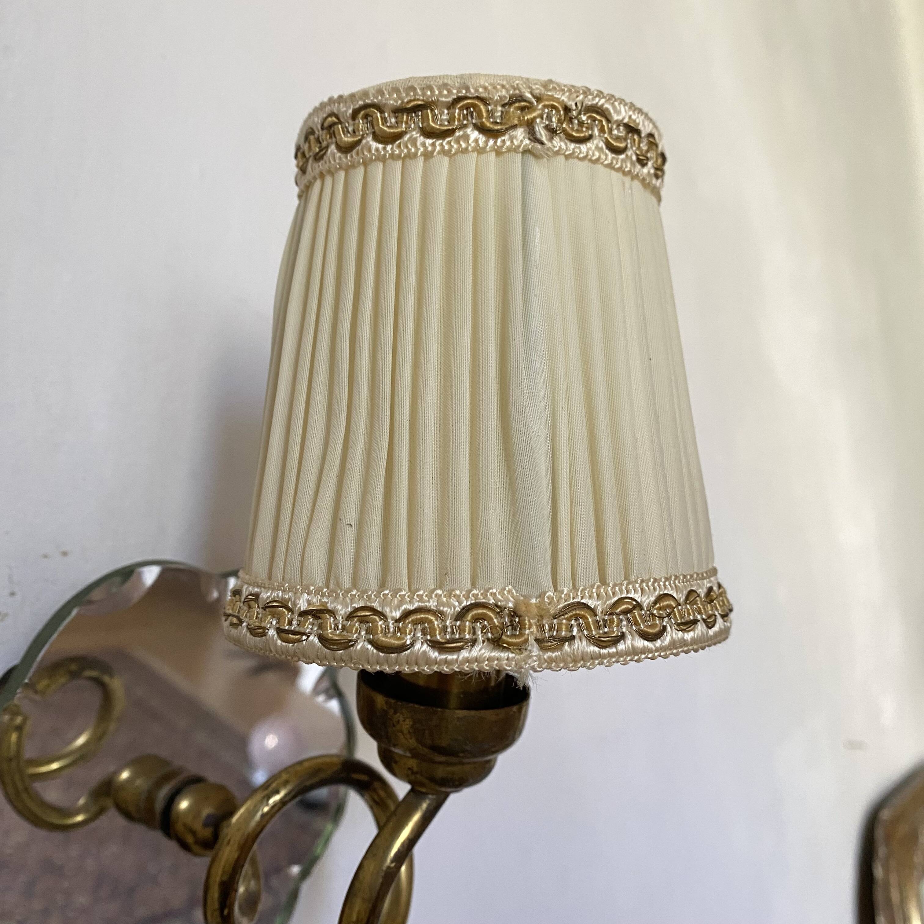 Pair of mirror and brass wall lights from the 50s and 60s