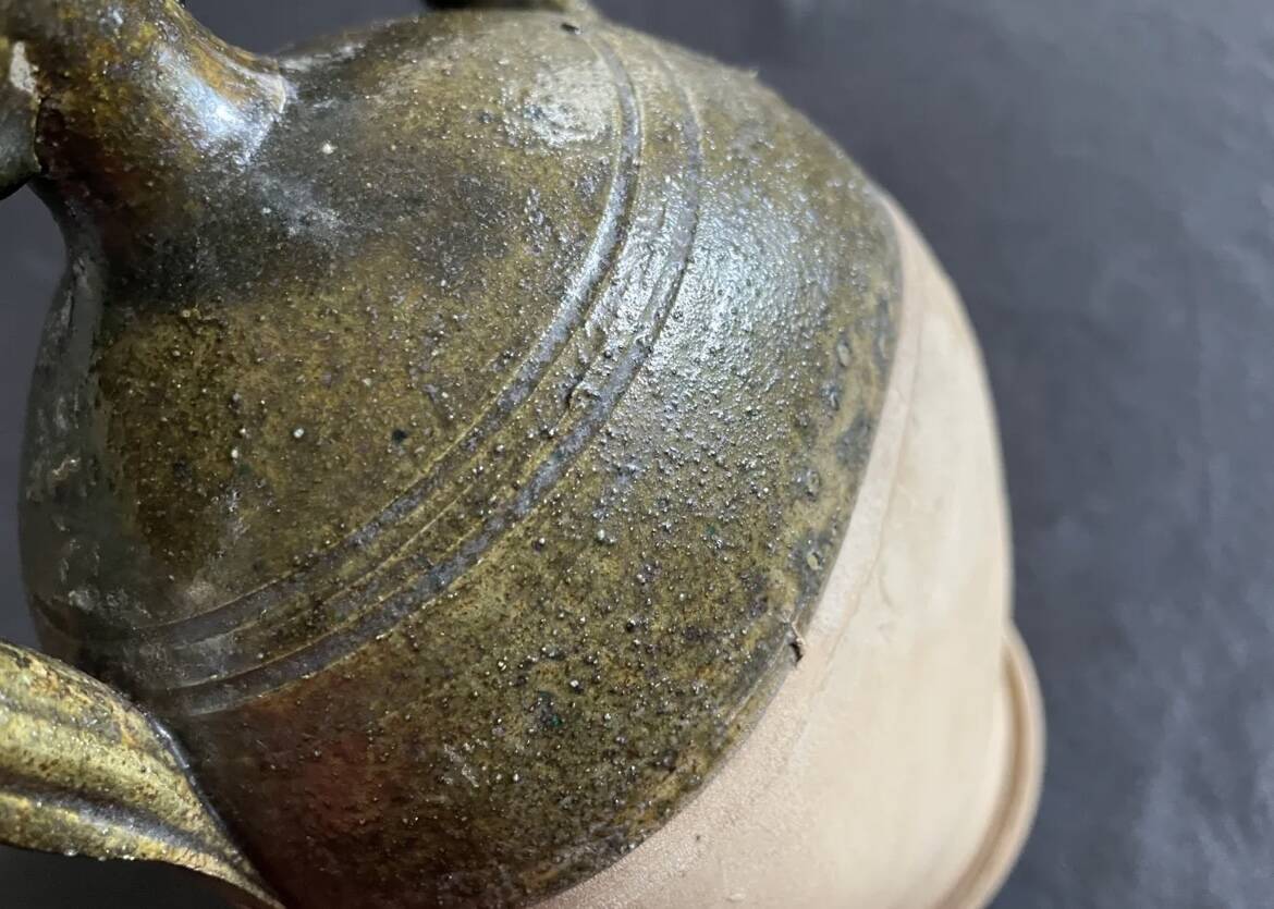Varnished terracotta oil jar
