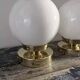 Paire d’appliques globes en opaline blanche