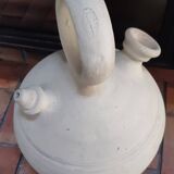 Old terracotta gargoulette jug
