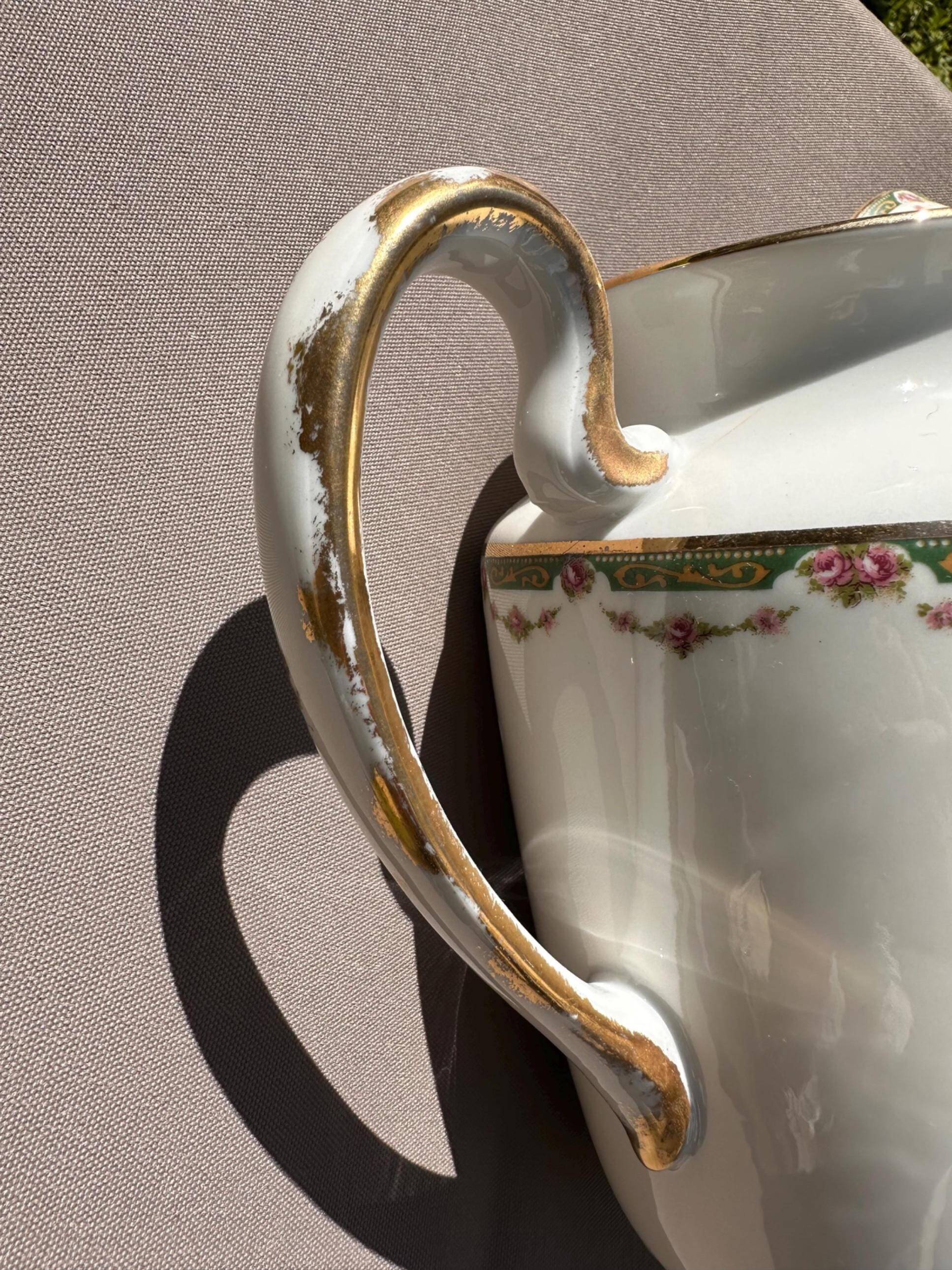 Set of jug, sugar bowl, and milk jug in Limoges porcelain by Paul Past.