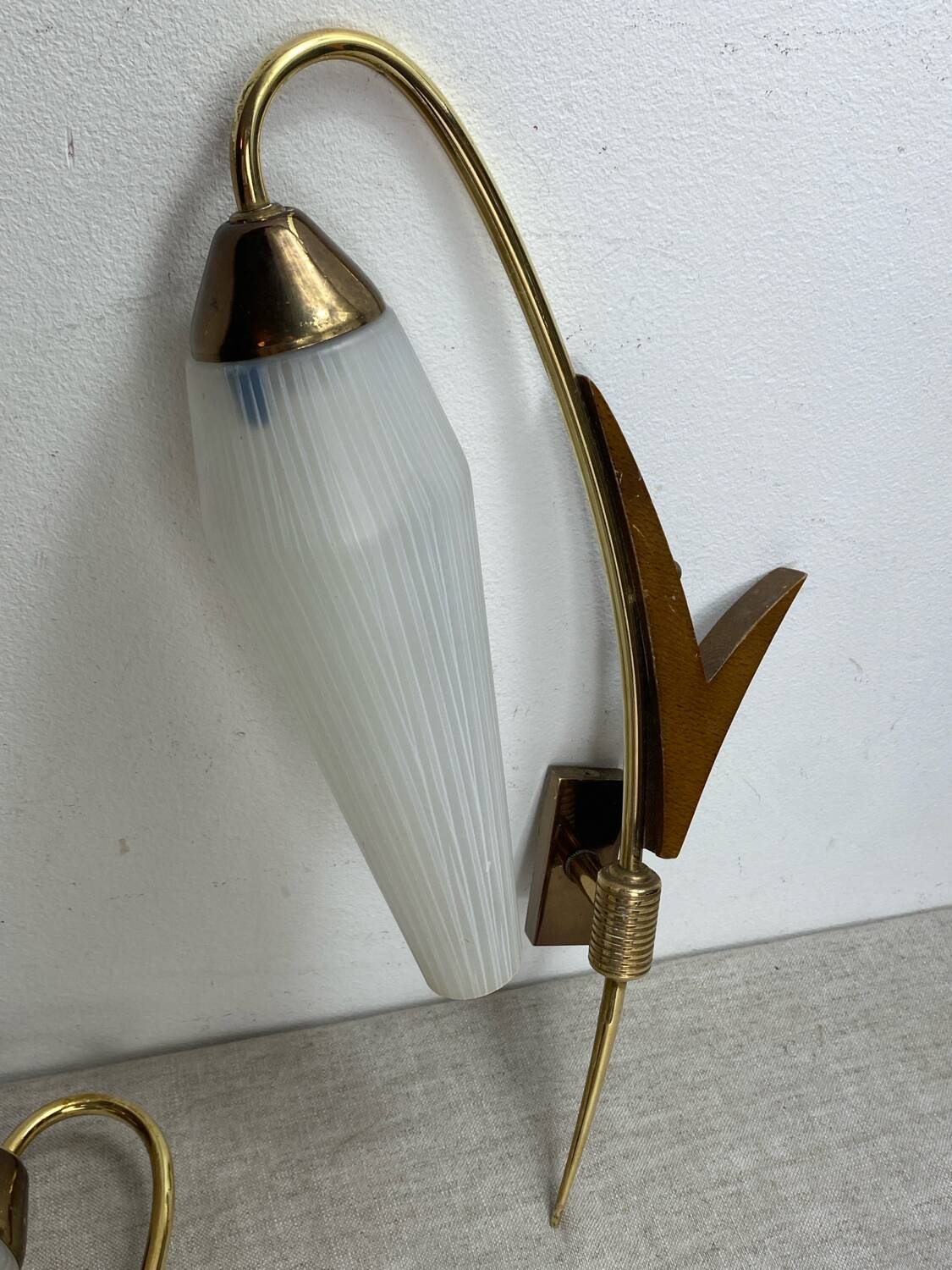 Pair of wall lights in brass, wood and opaline glass, 1950s/60s