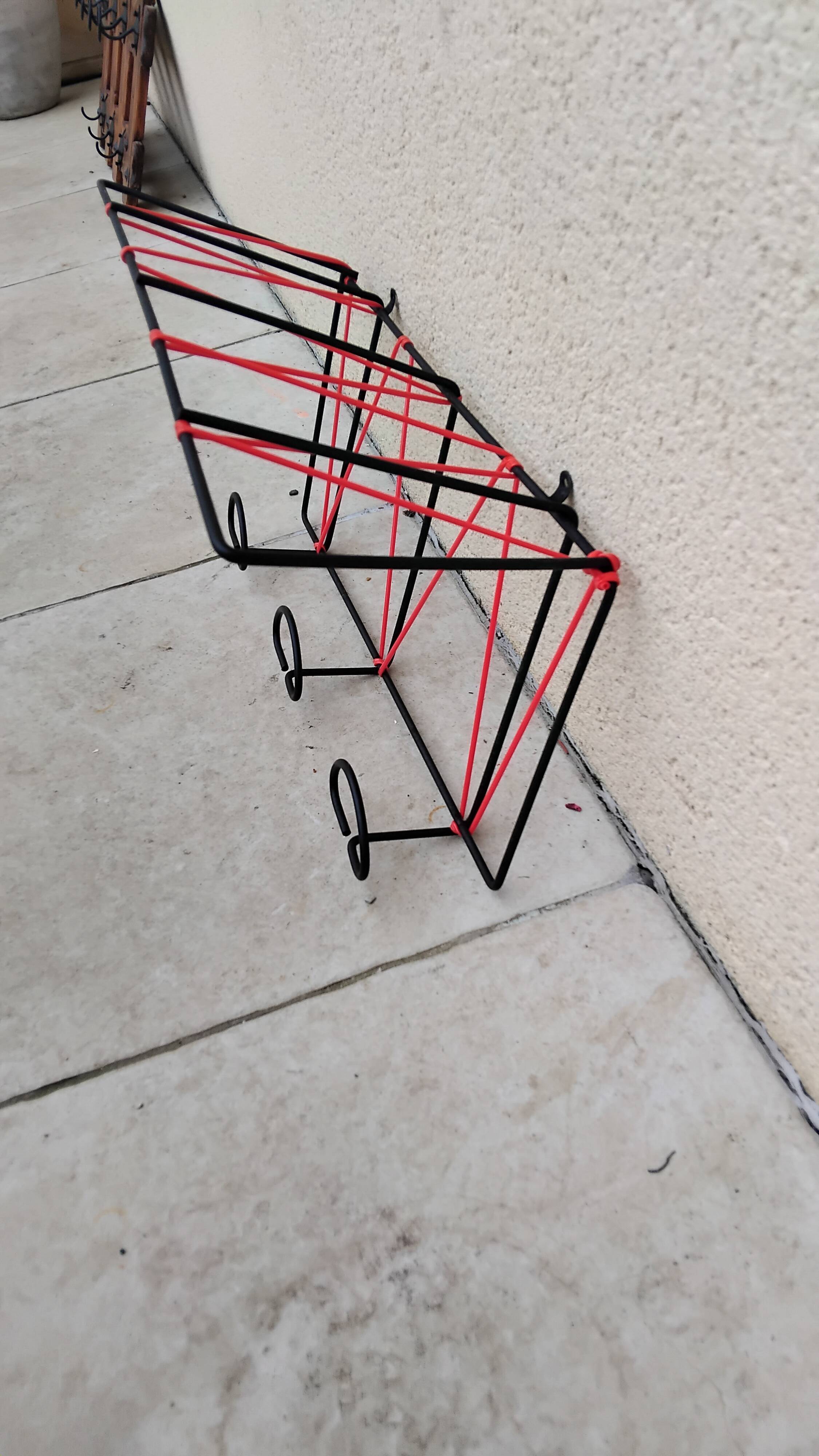 Vintage metal coat rack and wall-mounted scoubidou