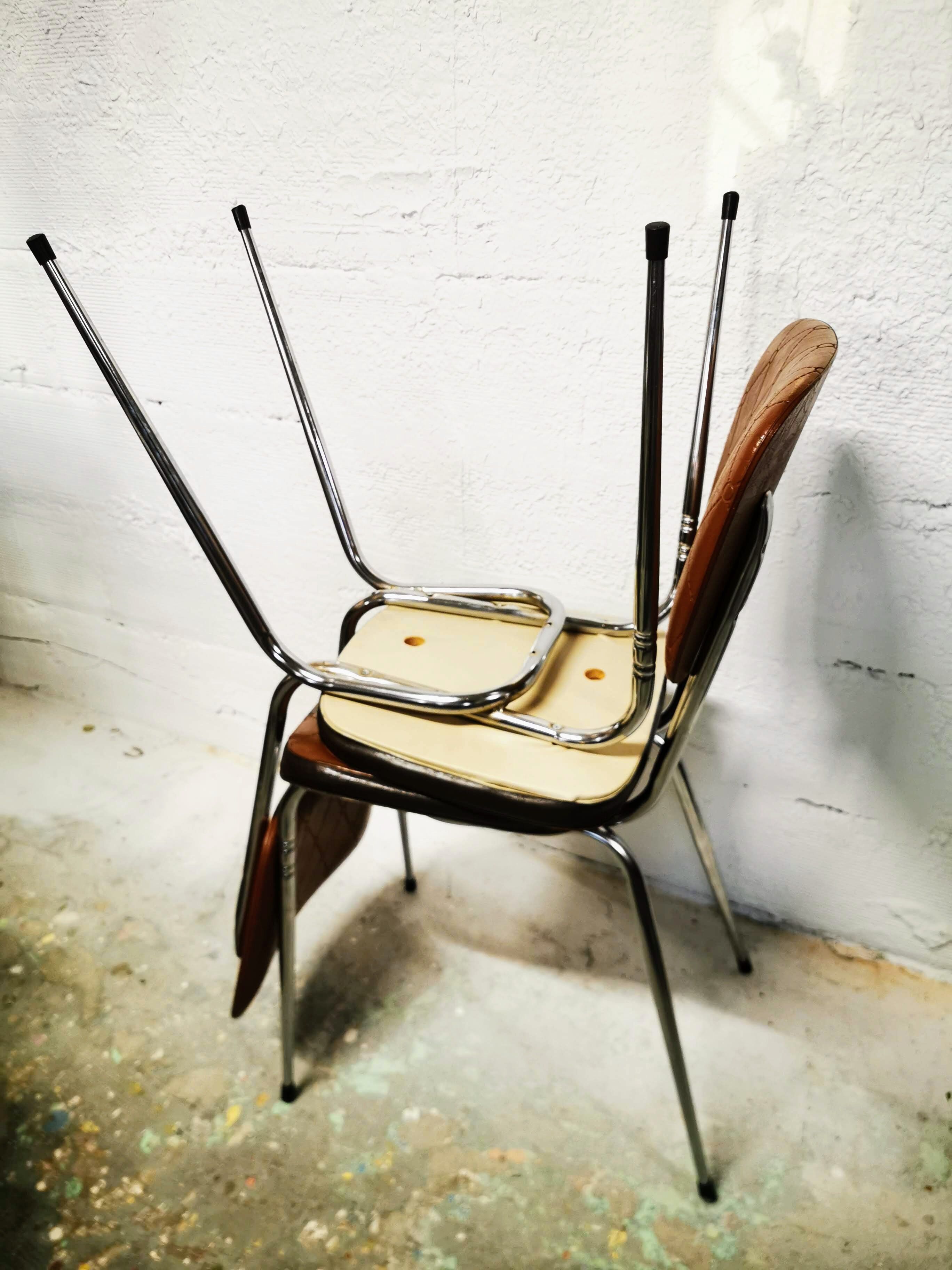 Pair of chrome and skai chairs