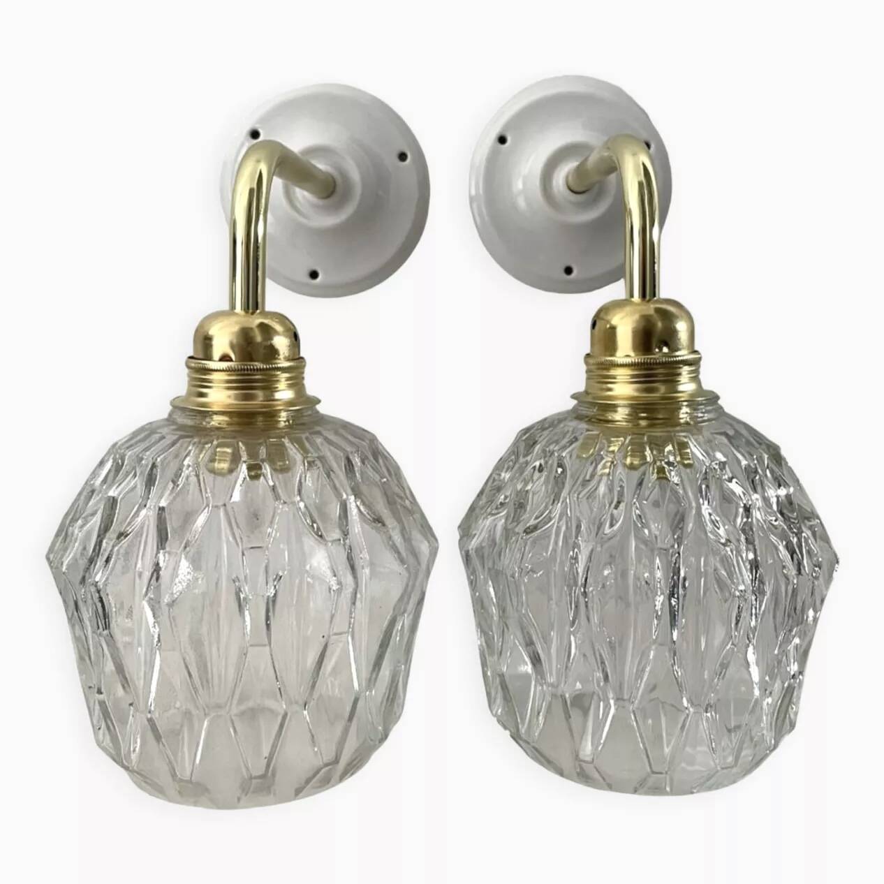 Pair of chiseled glass wall sconces