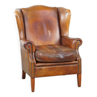 Fauteuil à oreilles en cuir de mouton