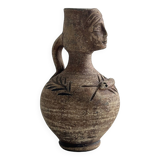 Ceramic woman face vase pitcher.