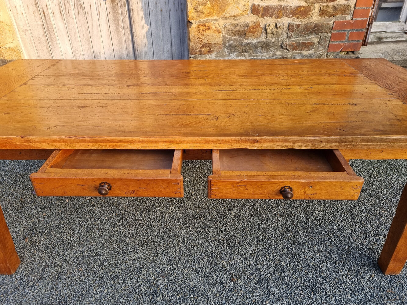 Solid oak farmhouse table, two drawers, vintage, early twentieth century.