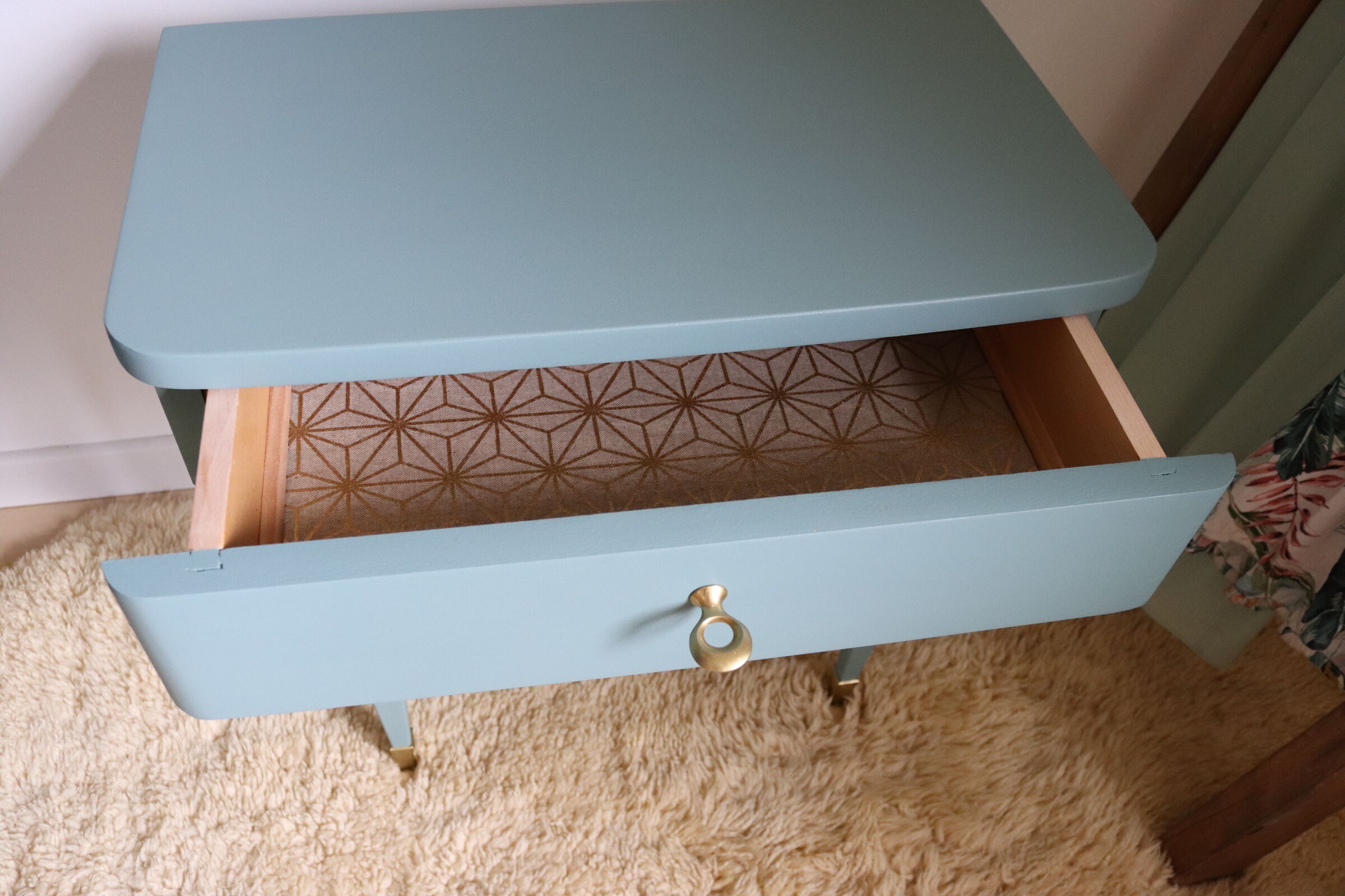 Bedside vintage blue feet compass