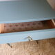 Bedside vintage blue feet compass