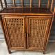 Rattan shelf with storage from the 1970s