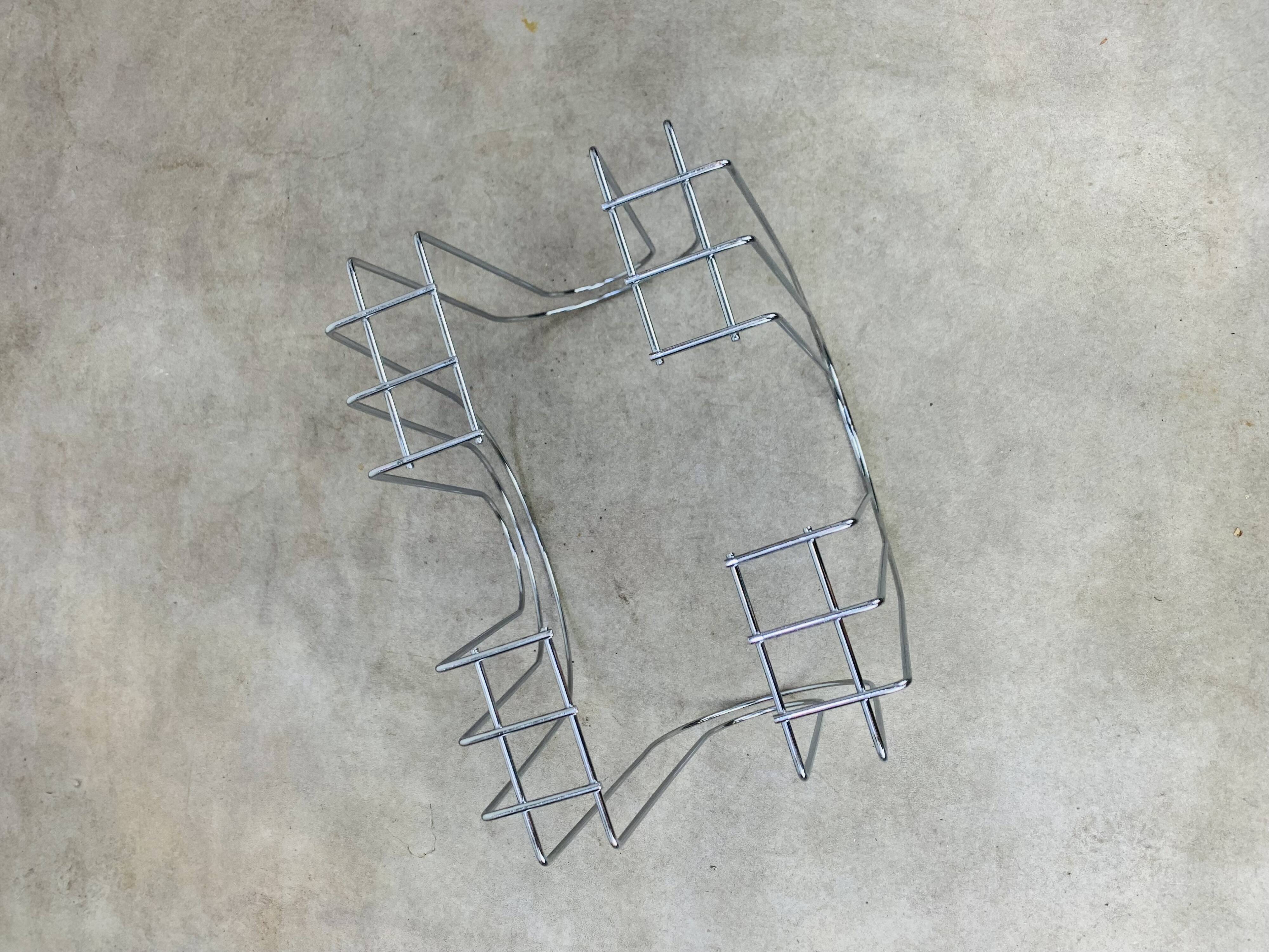 Postmodern chrome metal magazine rack from the 80s