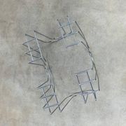 Postmodern chrome metal magazine rack from the 80s