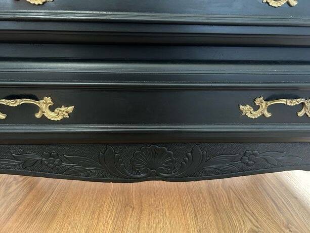 Louis XV style black and gold commode