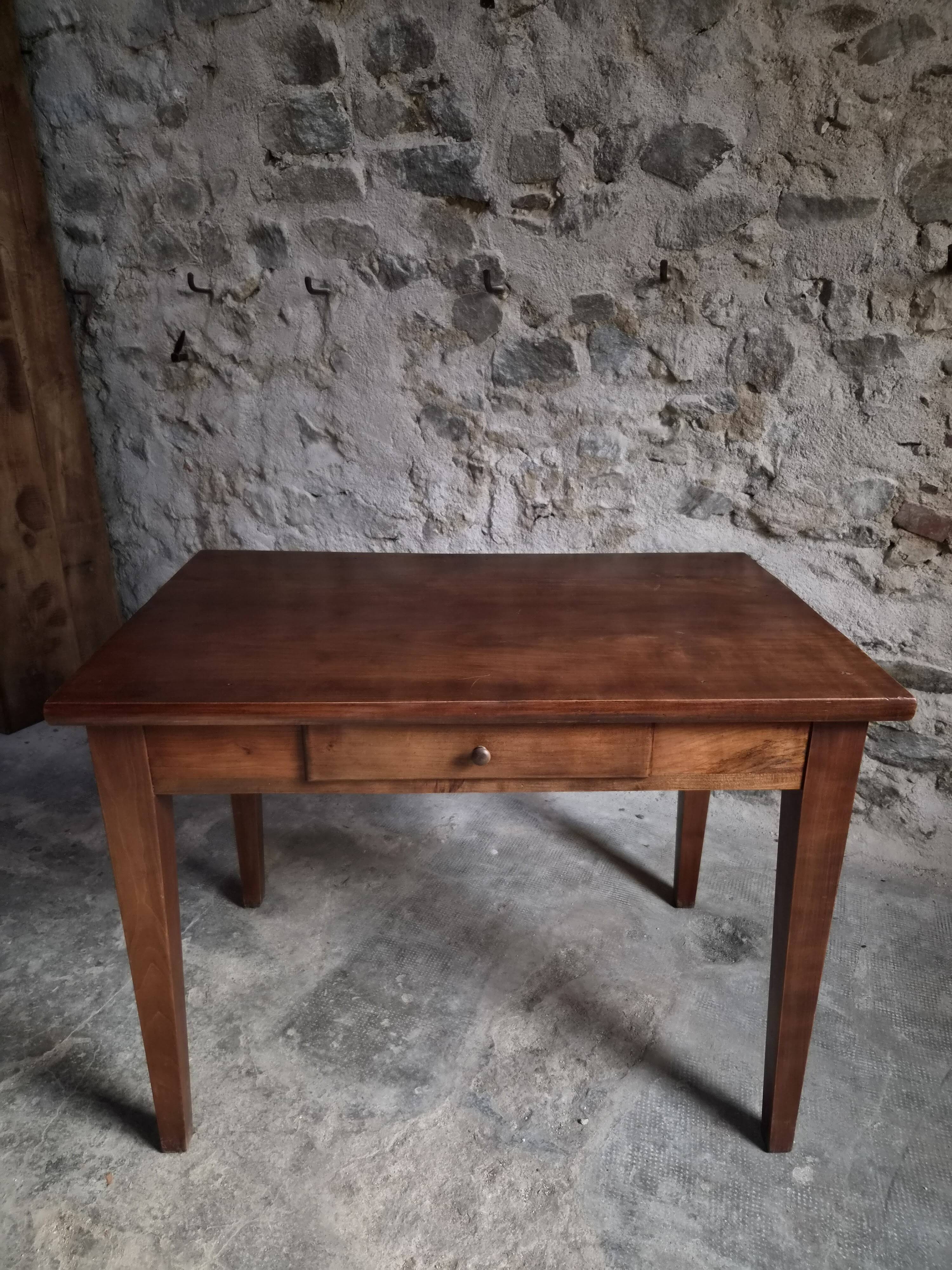 Old French table in cherry wood with bistro chair, circa 1900–1930.