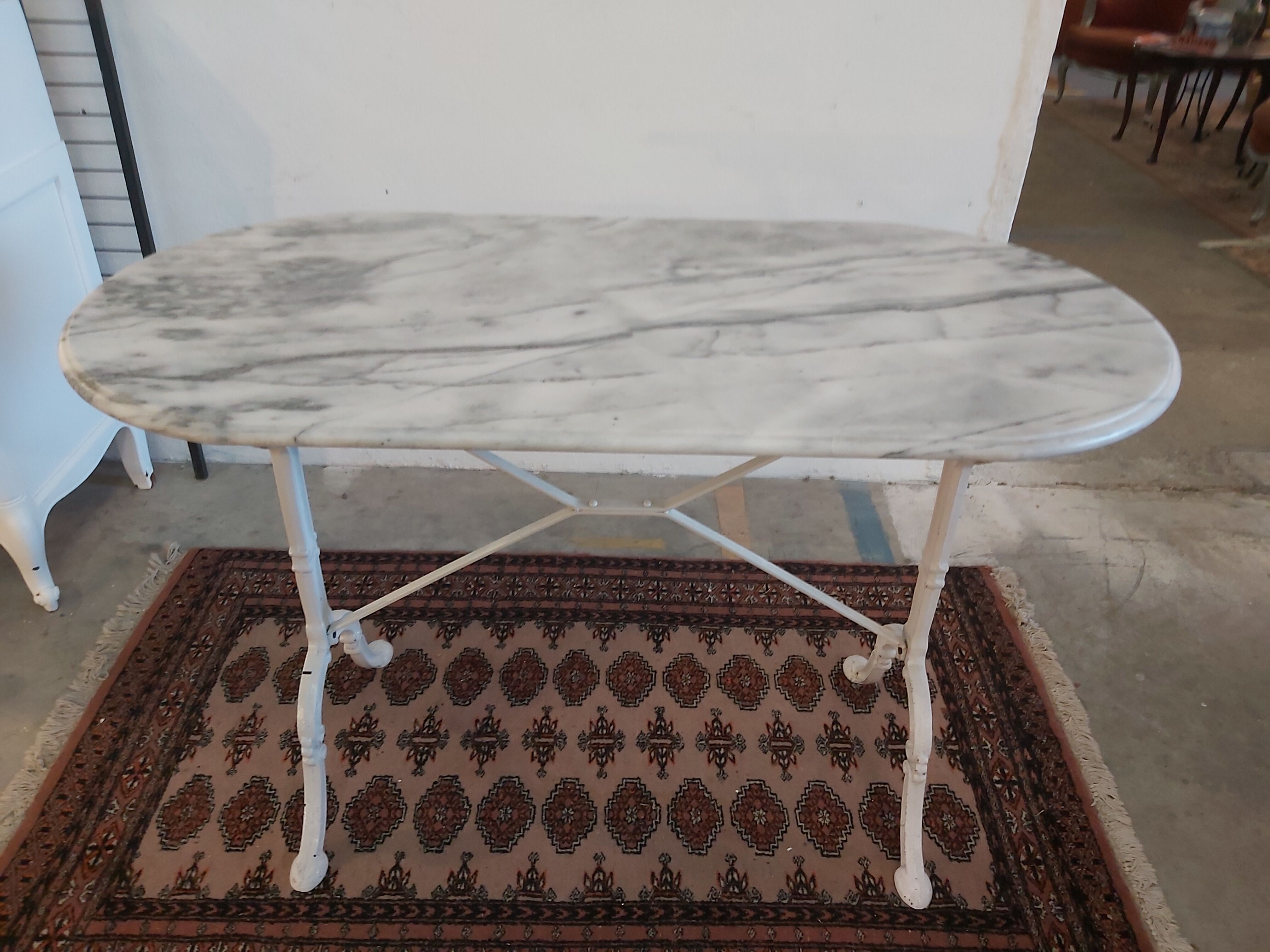 Marble and cast iron bistro table