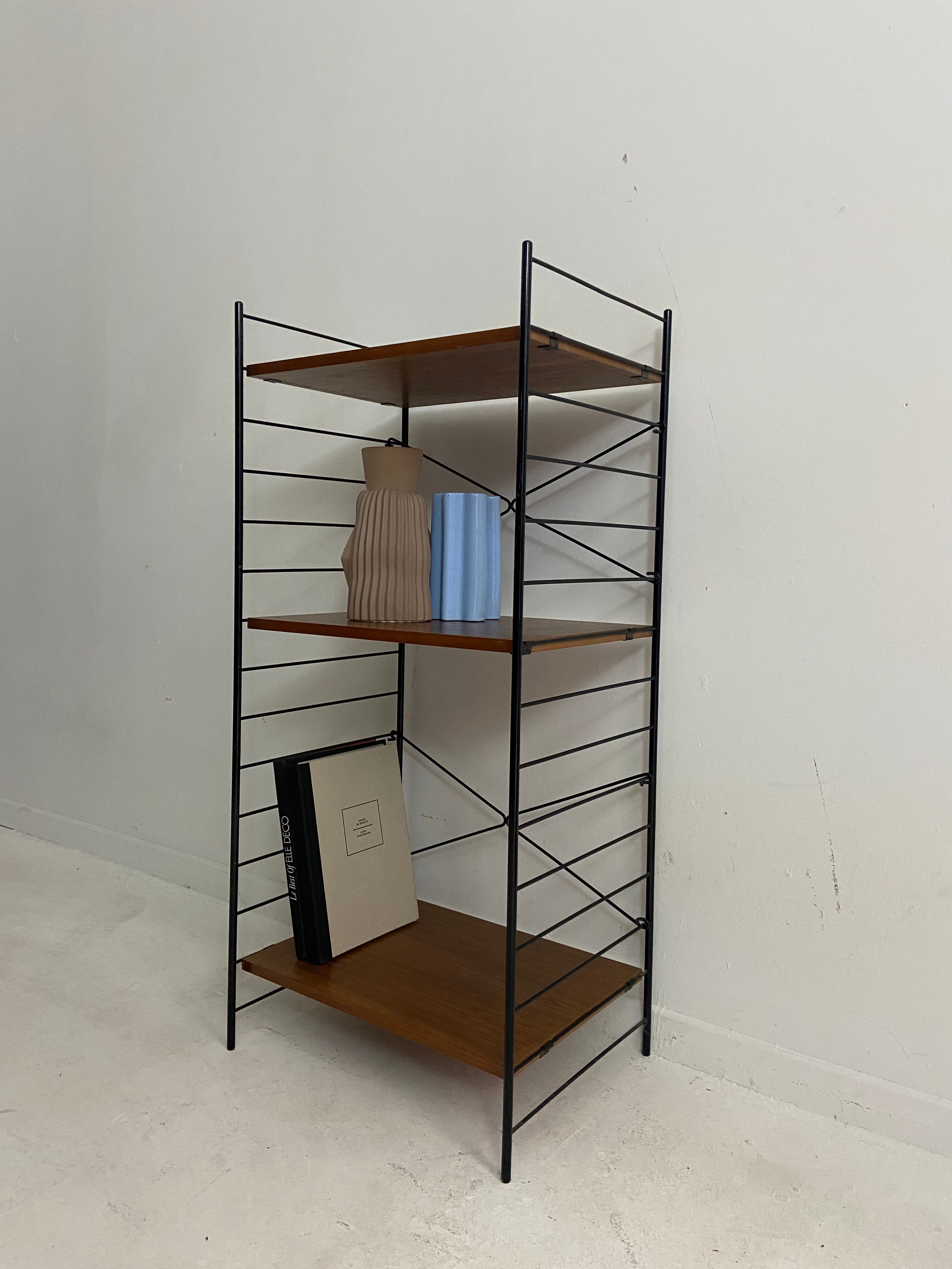 small vintage metal and teak string bookshelf
