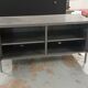 Small mouse gray industrial piece of furniture/sideboard.