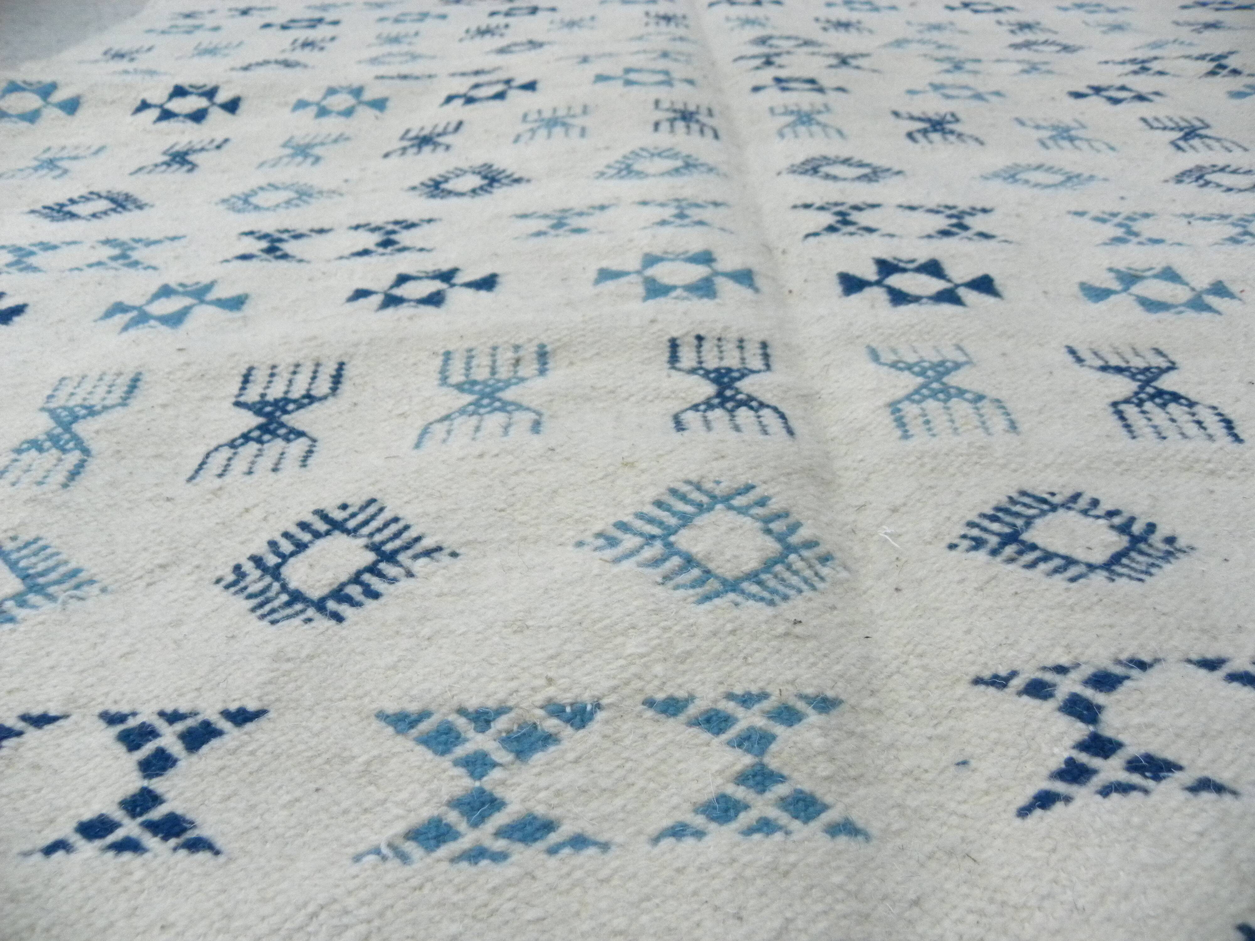 Nomadic Tunisian Berber rug, margoum kilim, ethnic in beige and blue wool.