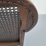 Colonial wooden armchair and cannage