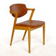 Four Kai Kristiansen oak chairs with new leather upholstery