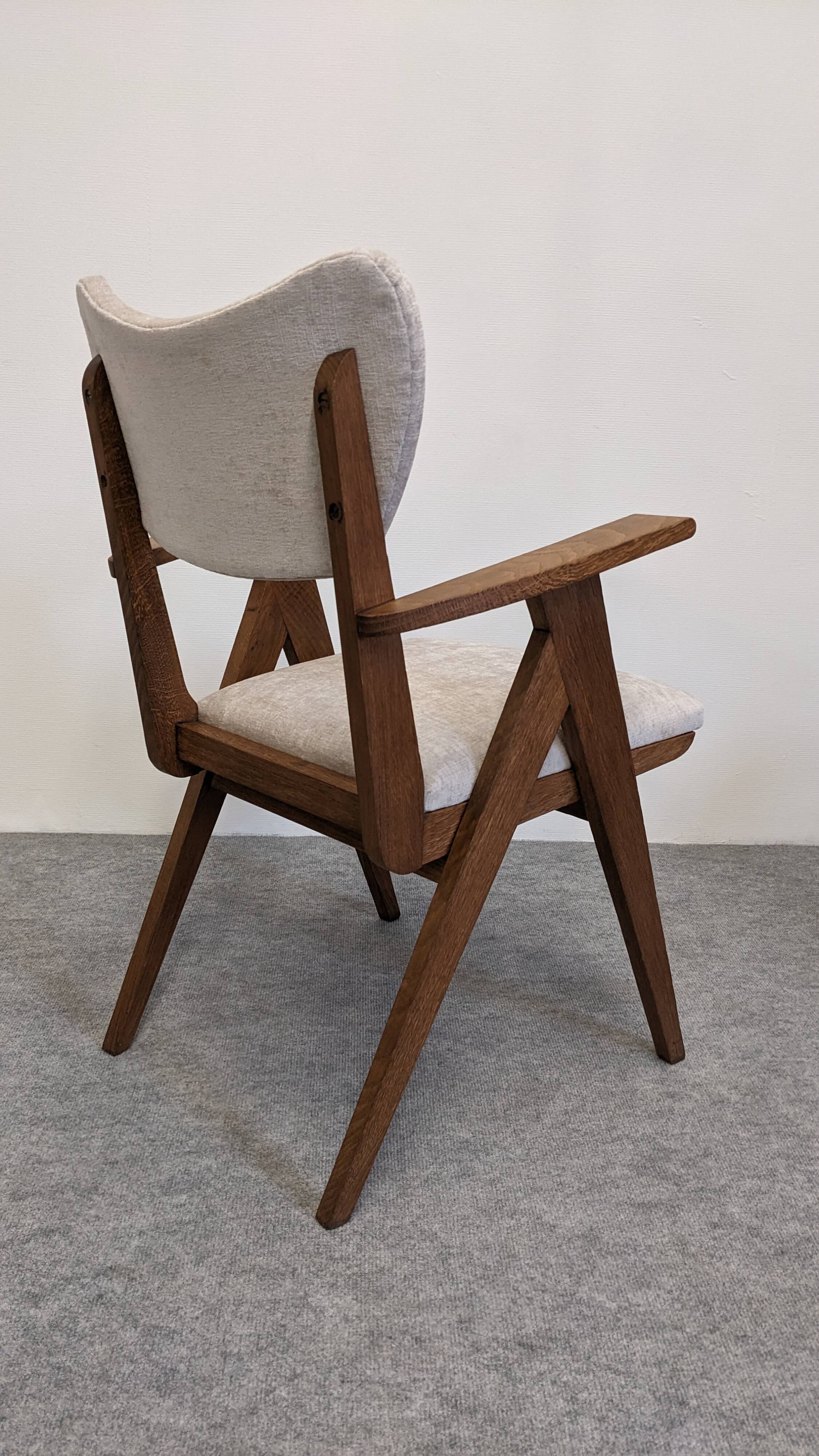 Pair of Scandinavian bridge armchairs in teak, Denmark circa 1950.