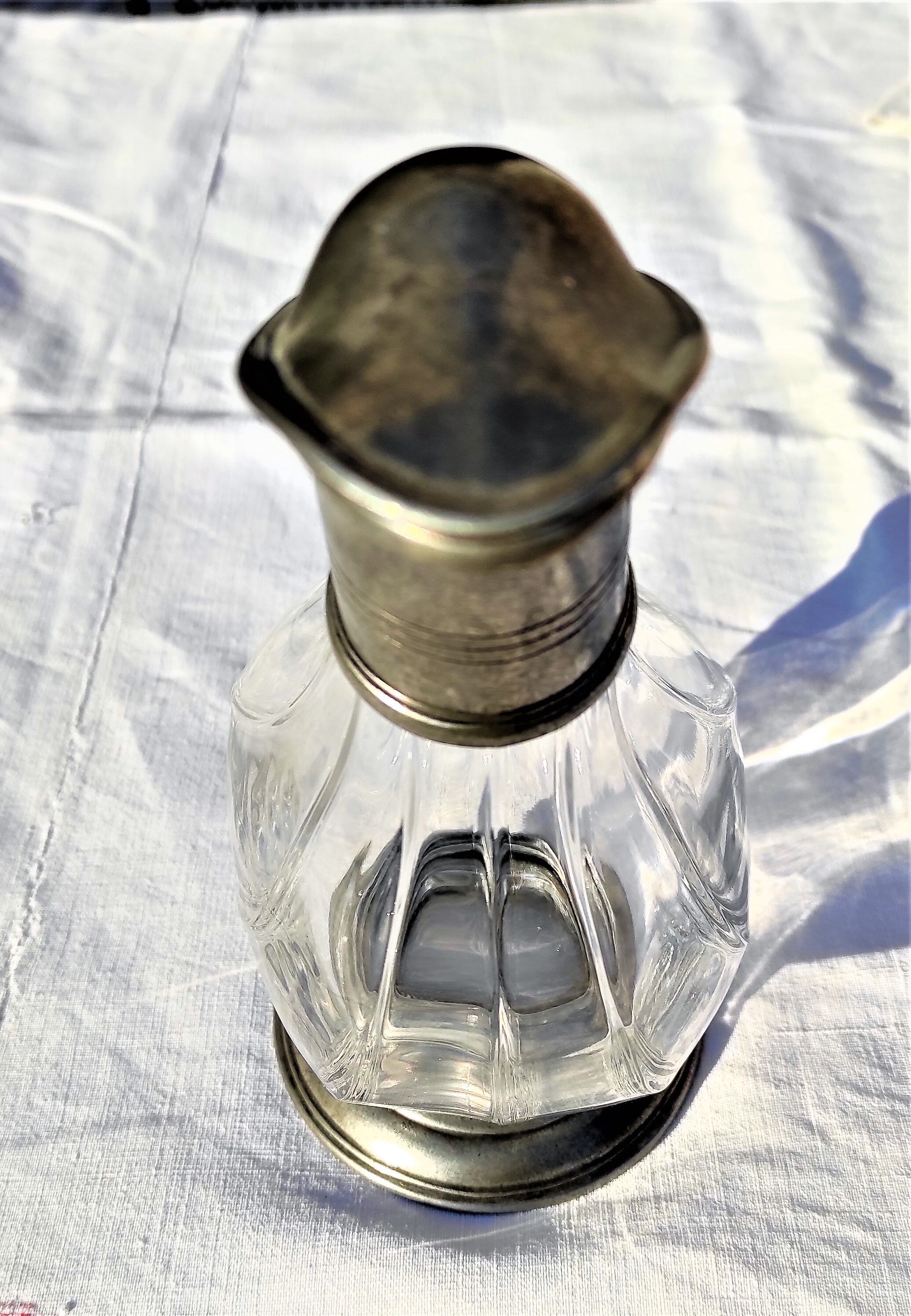 Old duck shaped decanter in crystal and tin