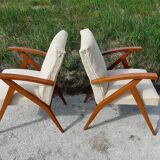 Pair of Scandinavian vintage armchairs in blond wood