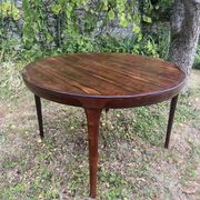Scandinavian dining table in Rio rosewood.