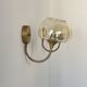 Pair of vintage wall lights in brass and smoked glass, France, 1970.