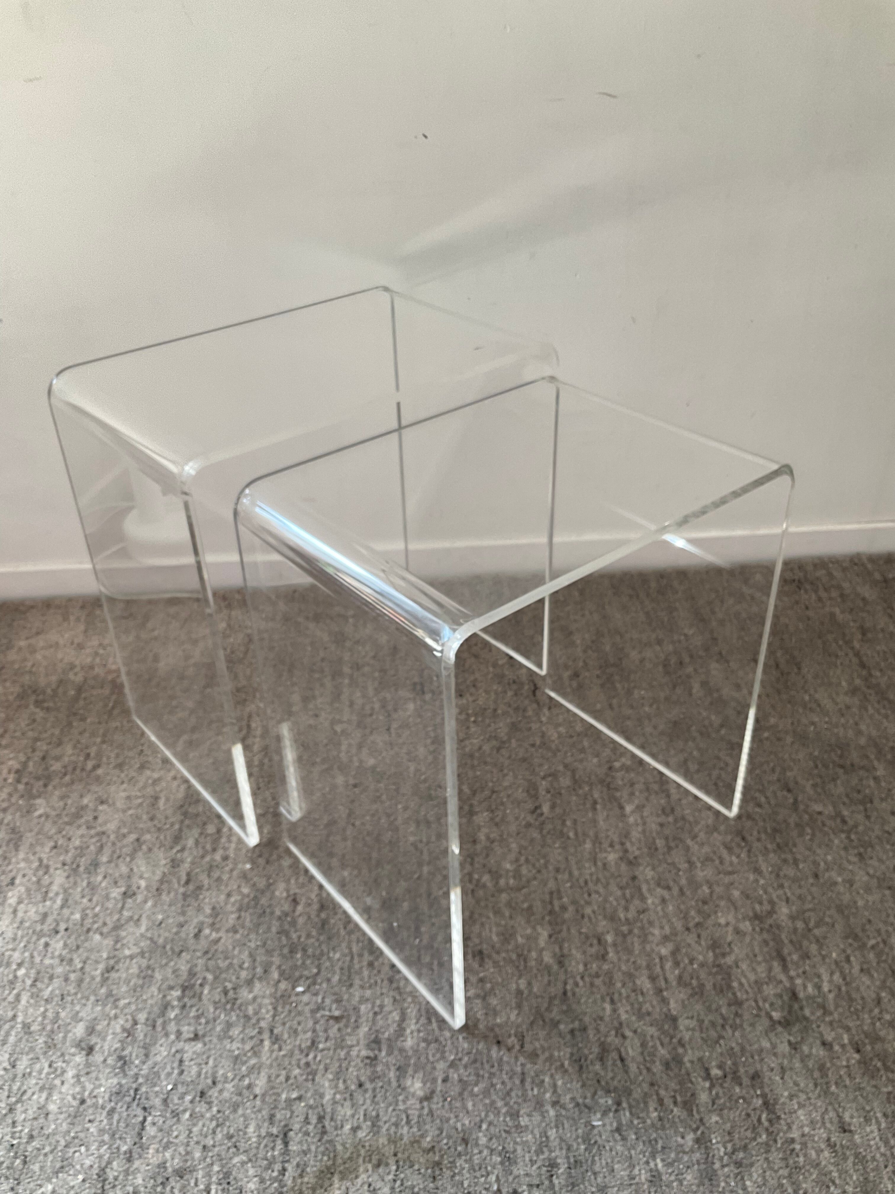 Duo of pull-out tables in plexiglass 70s