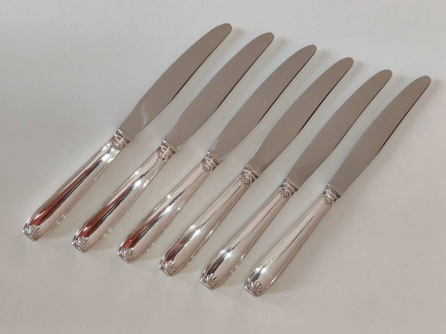 Silver-plated metal cheese knives