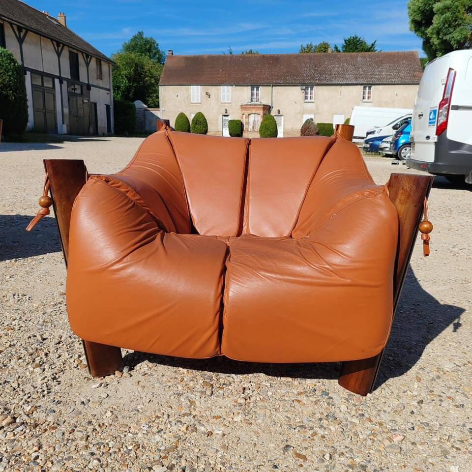 Percival lafer mp-211 sofa set with two armchairs and an ottoman in leather.