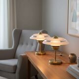 Pair of Art Deco bedside lamps in brass and engraved glass.