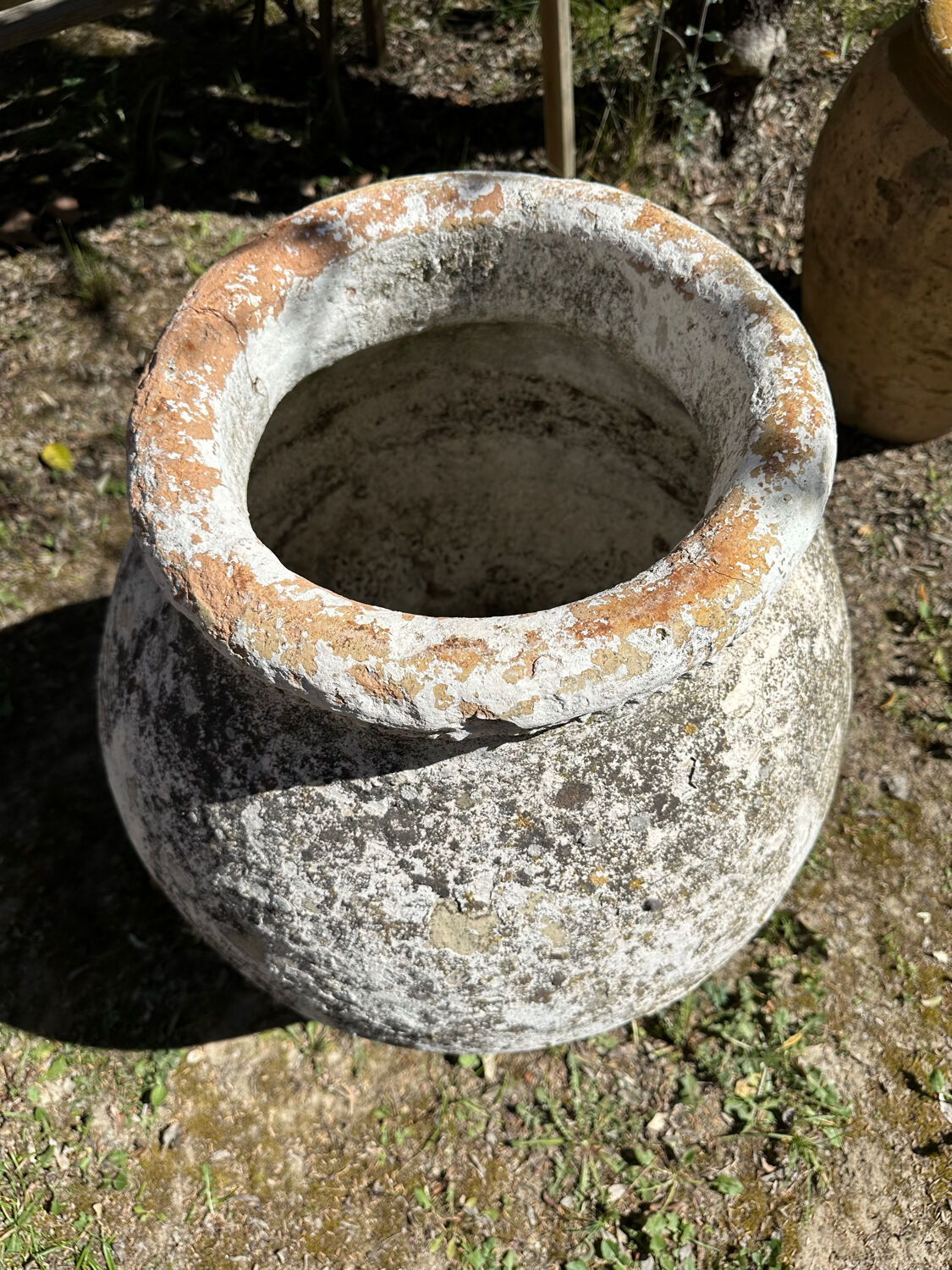 Large ancient pottery jar in terracotta from the 18th century.