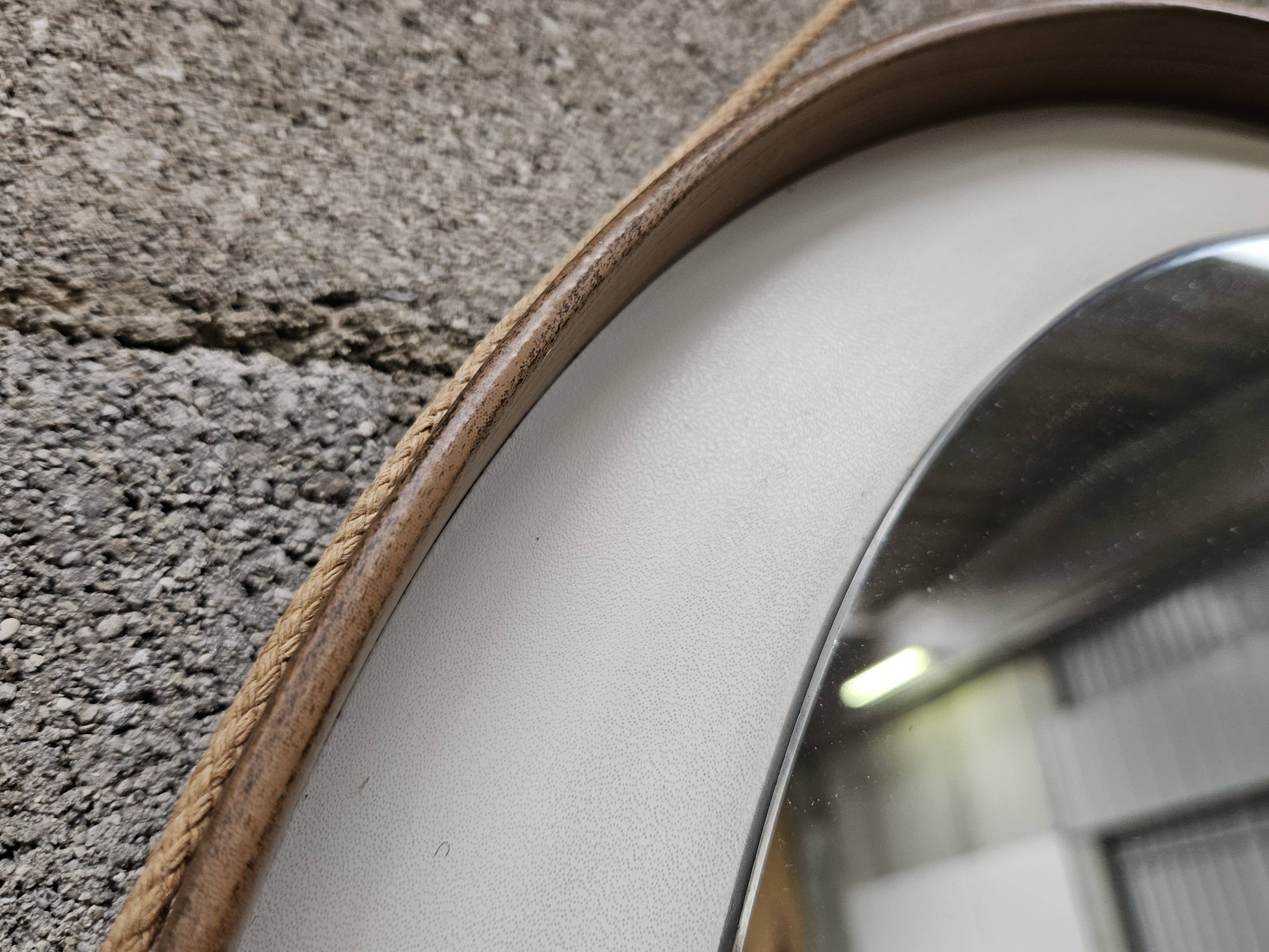 Vintage 1970s PVC and faux leather wall mirror