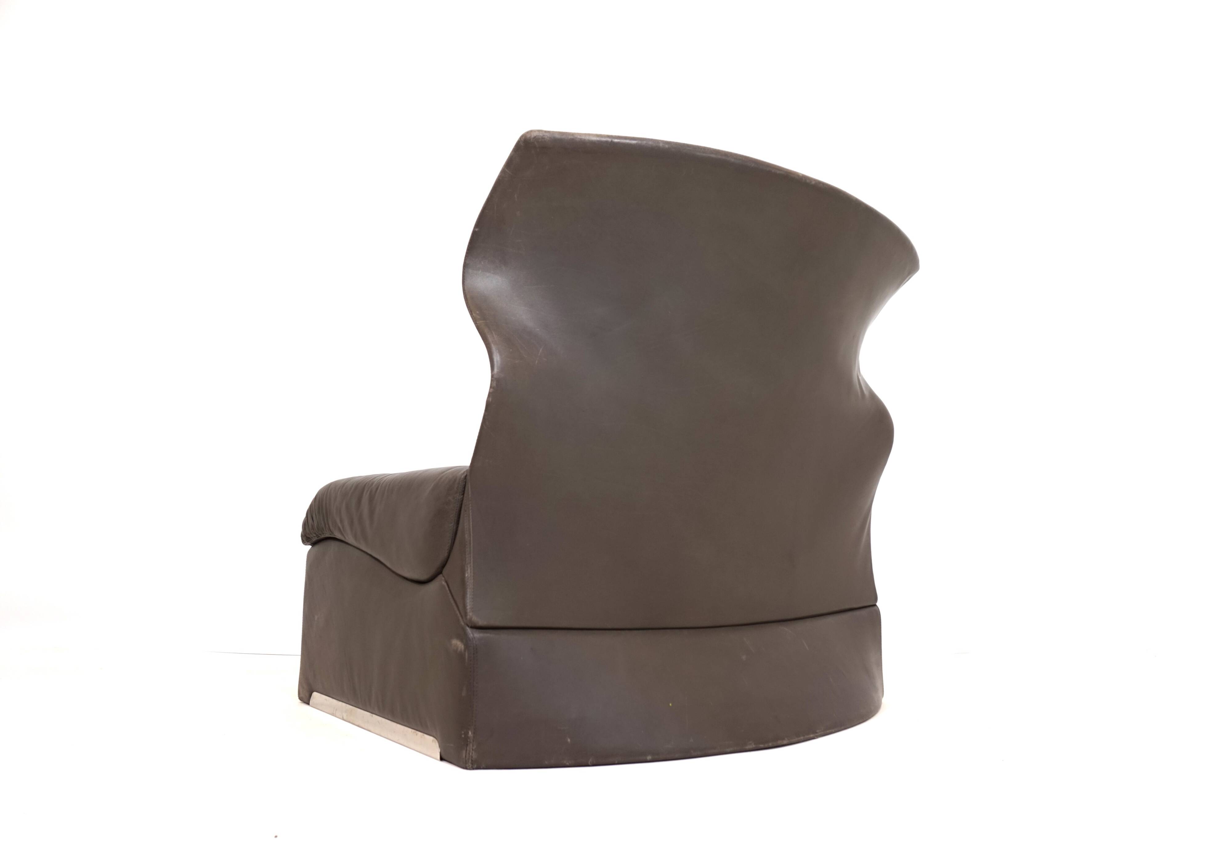 Saporiti Vela Alta leather armchair with ottoman by Giovanni Offredi
