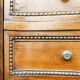 Pair of walnut crossbow chests of drawers