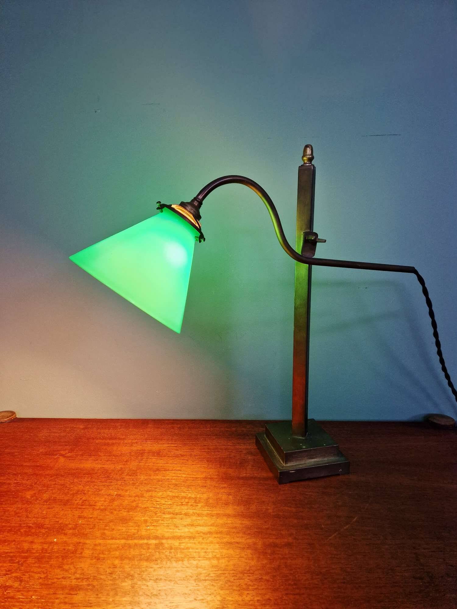 Bronze desk lamp with a green opaline conical shade, 1920.