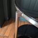 Vintage side table on wheels – black glass top