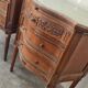 Pair of walnut crossbow chests of drawers