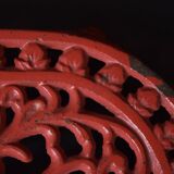 Red cast iron trivet