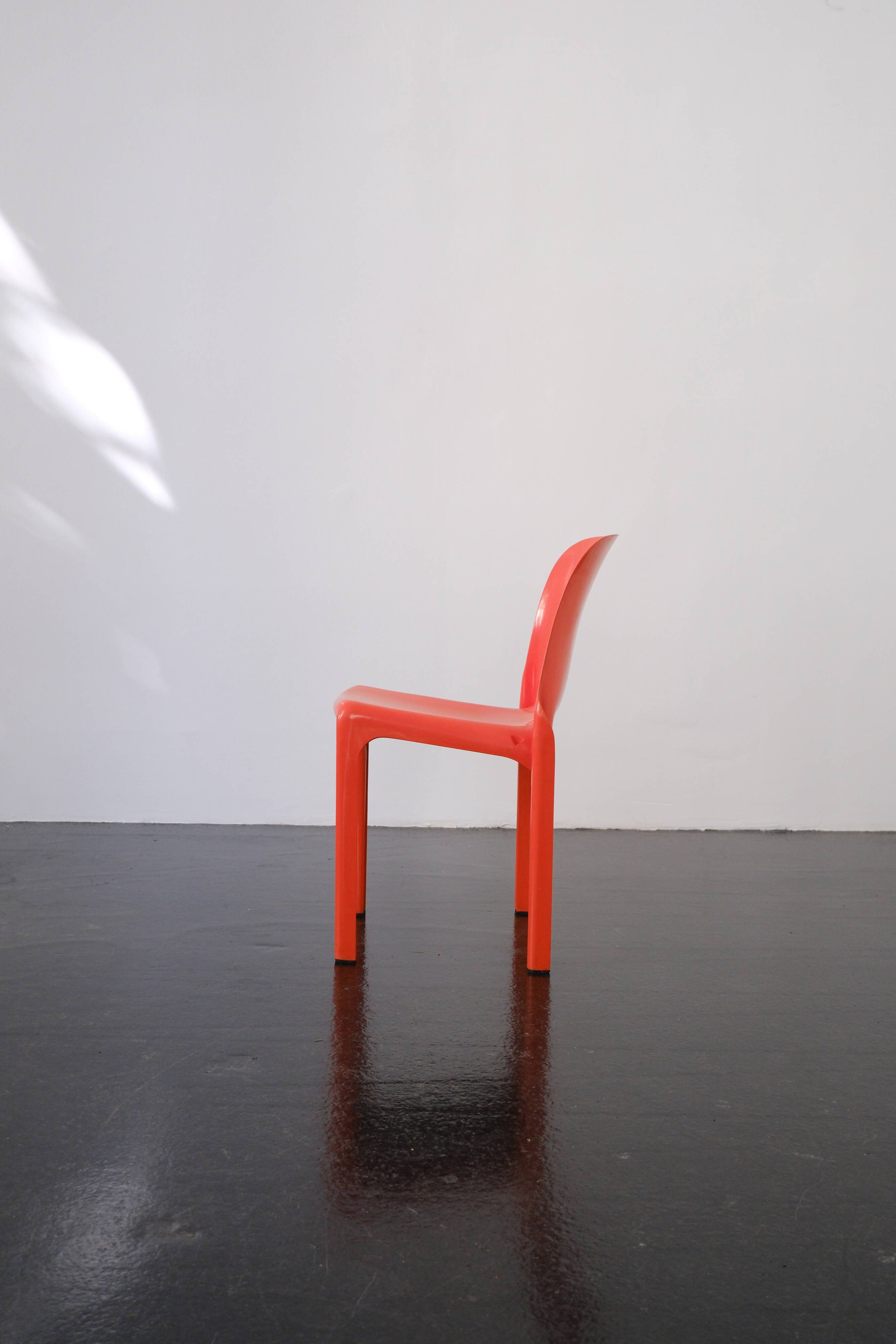 Orange "Selene" chair by Vico Magistretti / Artemide