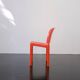 Orange "Selene" chair by Vico Magistretti / Artemide